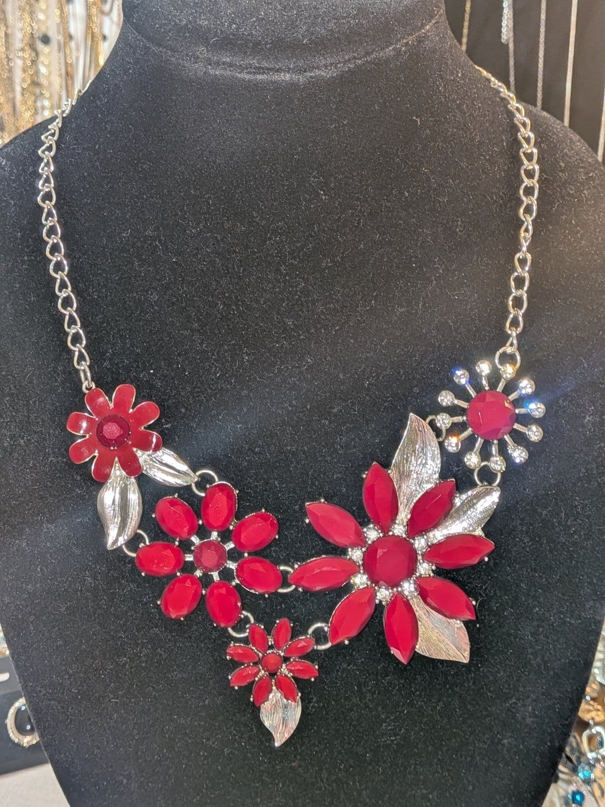 Silver tone red faceted glass stones with clear rhinestone accents. Statement Necklace 