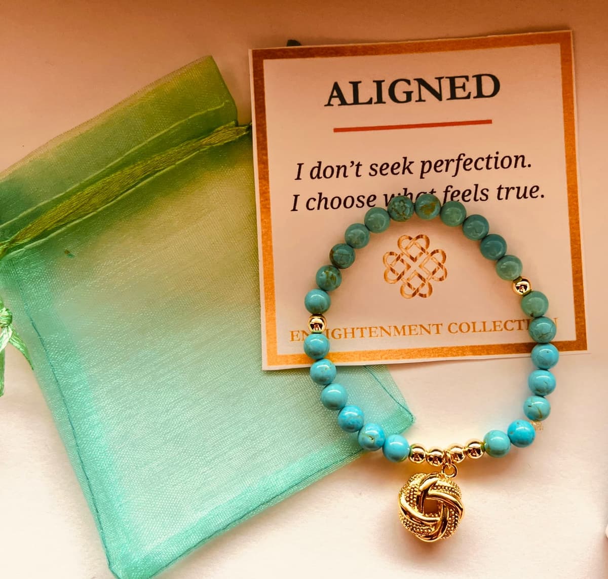 Aligned | Enlightenment Collection – Handcrafted with genuine turquoise gemstones, a gold Eternal Kn