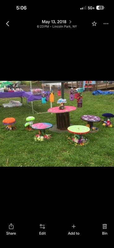Whimsical garden table with 3 stools set for children
