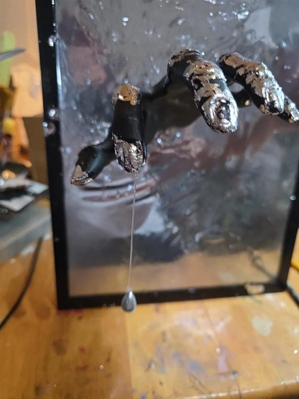 Hand Through the Mirror
