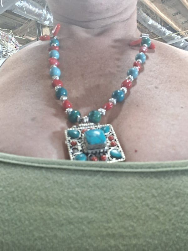 Turquoise and silver necklace.
